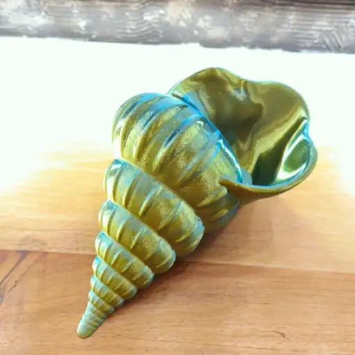 Deniz Salyangozu Saksı – Deniz Temalı Dekoratif Saksı Deniz Salyangozu Saksı, denizlerin altındaki renkleri yansıtan zarif formuyla bitkilerinizi sanatsal bir dille sergiler. Işığın geliş açısına göre yüzey rengi yeşil ve sarı tonlarına geçerek bulunduğu ortama gün boyu değişen bir canlılık katar. Deniz Salyangozu Saksı Özellikleri Deniz temalı, kabuk formunda dekoratif saksı Işığa göre yeşil–sarı renk değişimi ve derinlikli yansımalar Salon, çalışma odası ve giriş alanları için şık ev dekoru Sukulent, kaktüs ve küçük yapraklı bitkilerle uyumlu Dengeli taban ve kolay temizlenen yüzey Hediye etmeye uygun, koleksiyon değeri taşıyan tasarım Deniz Salyangozu Saksı Kullanım Önerileri Deniz Salyangozu Saksı, pencere önü, konsol üstü veya kitaplık raflarında tek başına odak noktası oluşturur. Açık yeşil, beyaz ya da sarı tonlu bitkilerle birlikte sergilendiğinde renk geçişlerini daha belirgin kılar ve iç mekânda dengeli bir kontrast sağlar. Daha fazla telefon standı ve dekoratif ürün görmek için Ürünlerimiz sayfamızı ziyaret edebilir, güncel paylaşımlar için Instagram hesabımıza göz atabilirsiniz. Deniz Salyangozu Saksı Bakım & Malzeme Deniz Salyangozu Saksı, kolay temizlenen yüzeyi ve dengeli tabanıyla günlük kullanıma uygundur. Yumuşak, kuru bir bezle siliniz; sert kimyasallardan kaçınınız. Sukulent/kaktüs gibi az su isteyen bitkilerle birlikte kullanıldığında renk geçişleri (yeşil–sarı) daha belirgin görünür.